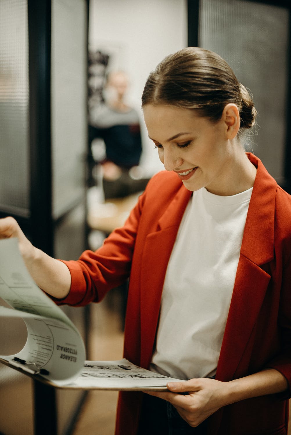 Female project manager reading documents